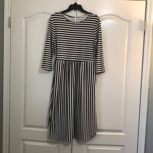 Black and white striped dress.